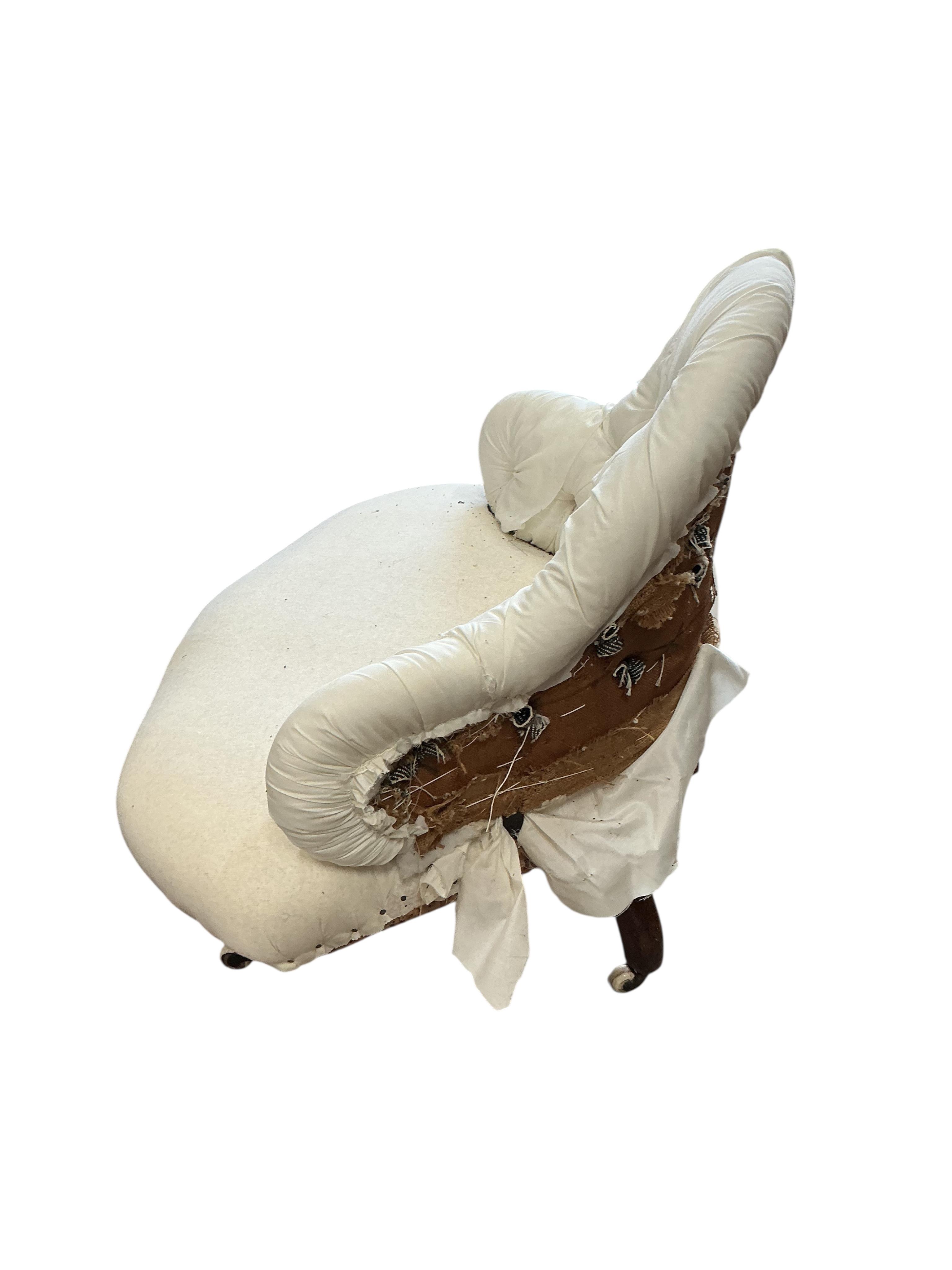 A Victorian part upholstered salon chair, width 86cm, height 78cm, in need of restoration